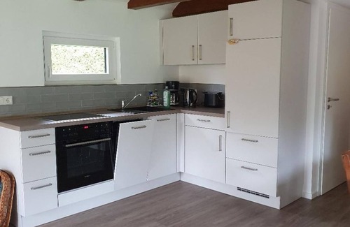 Wiefelstede House | Vacation home "Blockhaus am Waldrand" - vacation home, shower and bath, WC