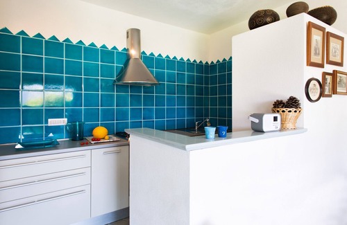San Pantaleo House | Vacation Home "Casa magnolia San Pantaleo" with A/C, Garden & Terrace; Parking Available