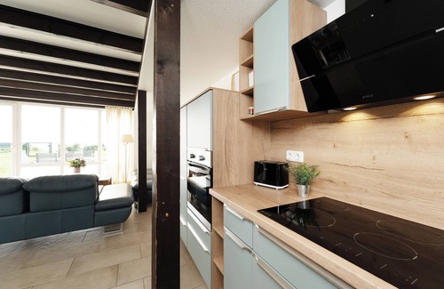 Sutel House | Vacation home Dat Strandhuus with 2 terraces in Sütel-Strand