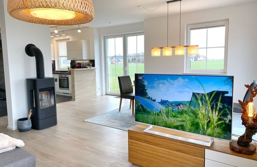 Dranske House | Vacation home "Distelfink" in Dranske/Lancken - thatched roof house with Bodden view,