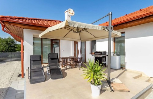 Buzsak House | Vacation home Emily by Interhome