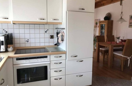 Ditzum House | Vacation home Henny - with private garden. Only 6 minutes walk to the harbor