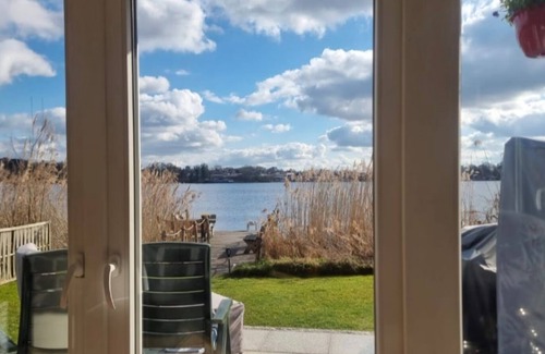 Moelln House | Vacation home Mölln am Ziegelsee bathing jetty swimming fishing boat 3 persons dog