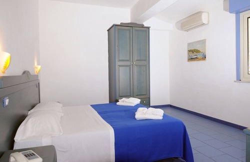 Province of Messina House | Vacation Home "Oasi Azzurra - Bilocale Standard-102" with Shared Pool & 2 Shared Terraces