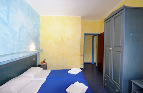 Province of Messina House | Vacation Home "Oasi Azzurra - Bilocale Standard-102" with Shared Pool & 2 Shared Terraces