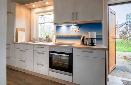 Suederhafen Apartment | Vacation home Ocke with sun terrace - Deichhelden Nordstrand