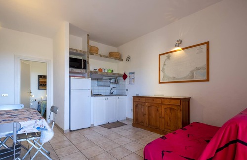 La Pelosa House | Vacation Home "Pergola 706" a few meters from the Beach with A/C & Private Terrace