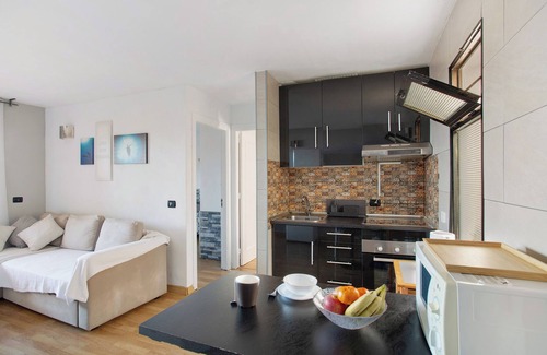 Puerto Rico Apartment | Vacation Home "Sunset" with Sea View, Shared Pool & Wi-Fi
