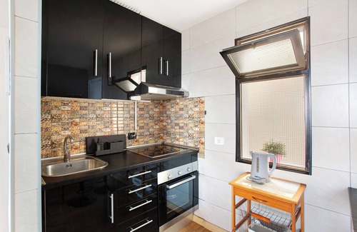 Puerto Rico Apartment | Vacation Home "Sunset" with Sea View, Shared Pool & Wi-Fi