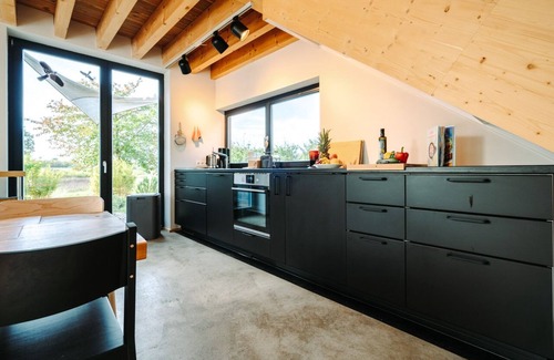 Muritz House | Vacation home Übersee with water view
