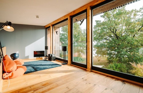 Muritz House | Vacation home Übersee with water view