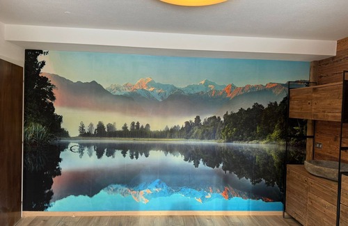 Engadin Scoul House | Vacation home with wellness area in alpine chic retro style