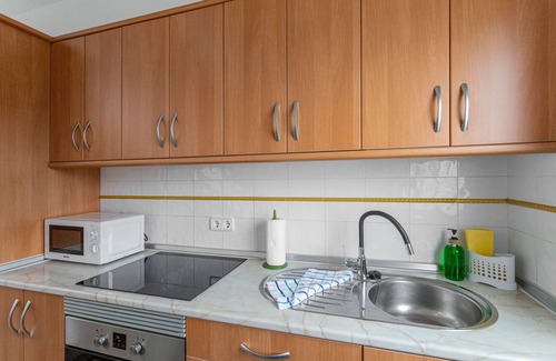 Moya Apartment | Vacation 'Los Adejo' with Shared Terrace, Shared Garden and Wi-Fi