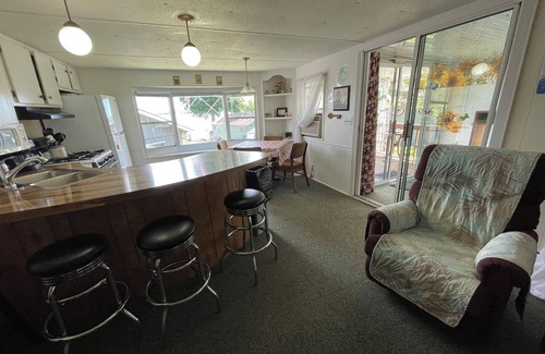 Herron House | Vacation Stay at Hubbard Lake Air-Conditioned Lakefront Mobile Home