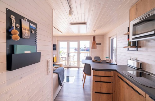 Fehmarnsund House | Vacations on a houseboat - pure relaxation for water and landlubbers alike!