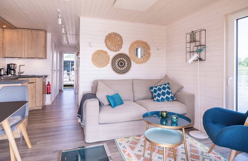 Fehmarnsund House | Vacations on a houseboat - pure relaxation for water and landlubbers alike!
