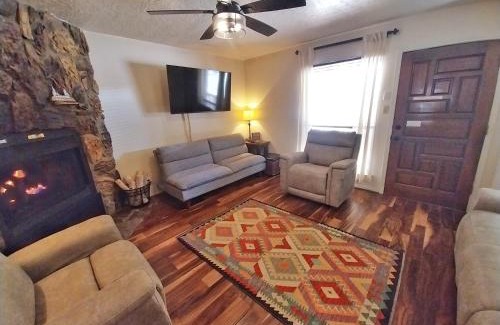 Red River House | Valley Condo 117 - Creekside - WiFi - Hot Tub - Fireplace - Washer - Dryer - Playground