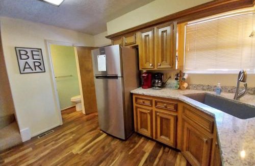 Red River House | Valley Condo 117 - Creekside - WiFi - Hot Tub - Fireplace - Washer - Dryer - Playground