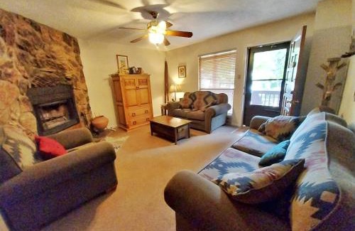 Red River House | Valley Condo 124 - Creekside - WiFi - Hot Tub - Fireplace - Washer - Dryer - Playground