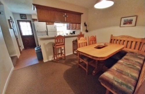 Red River House | Valley Condo 124 - Creekside - WiFi - Hot Tub - Fireplace - Washer - Dryer - Playground