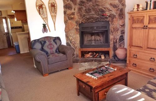 Red River House | Valley Condo 124 - Creekside - WiFi - Hot Tub - Fireplace - Washer - Dryer - Playground