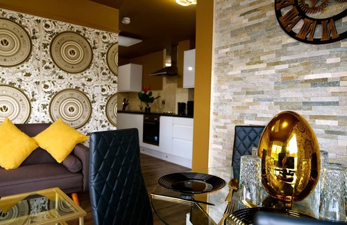 Rotherham Apartment | Versace Gold Apartment Opulence