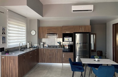 Diaz Ordaz Condo | Versalles Fab New Modern Spacious Condo, Veiws, Walk to the Beach, Rooftop Pool