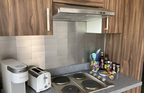 Diaz Ordaz Condo | Versalles Fab New Modern Spacious Condo, Veiws, Walk to the Beach, Rooftop Pool