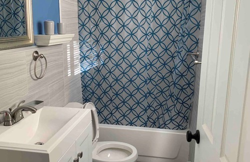 Levittown House | Very peaceful bedroom with separate bathroom and entrance