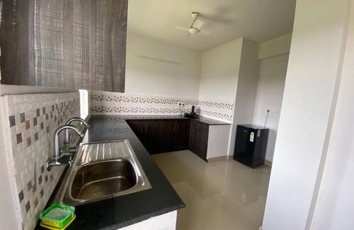 Kumbalam Hotel | Veu Ragamalika Apartment with Fully Equipped Kitchen, Balcony & Caretaker