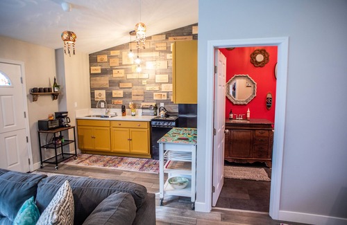 Lakeside Apartment | Vibrant Bohemian Loft Apartment with Shared Pool, Garden & Colorful Murals