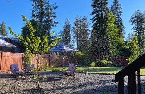 Spirit Lake House | Vibrant Forest Retreat - Game Room, Spa, Fire Pit - Sleeps10