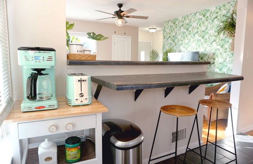 Cedar Rapids House | Vibrant Getaway! 2 Baths + Walk in Shower, Great Amenities & Value