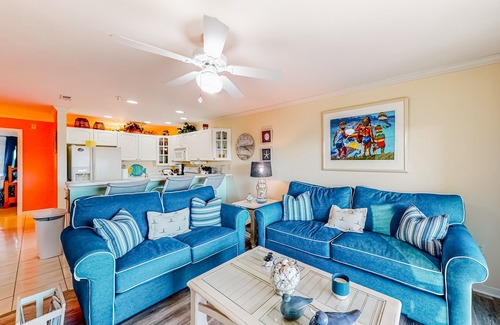 Heron Harbour Isle Condo | Vibrant waterfront condo with canal views, pools, & private balcony