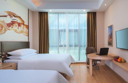 Jinshan Hotel | Vienna Hotel (Shanghai jinshanwei Railway Station City Beach Shop)