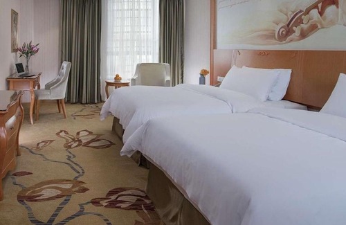 Haicang Hotel | Vienna Hotel(Zhangzhou Jiaomei WanYi square store)
