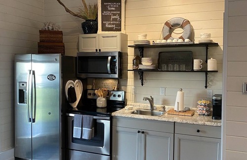 Hubert Apartment | View of intracoastal waterway with private dock and boat lift.