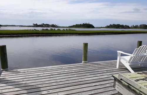 Hubert Apartment | View of intracoastal waterway with private dock and boat lift.