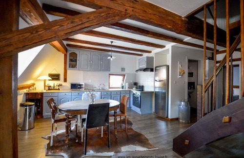 Riquewihr Apartment | View over the vines in a completely renovated Alsatian house.