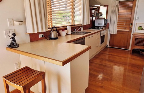 Nelson South House | Views, art, comfort, charming house in Nelson. Deck, beautiful garden and lounge