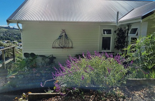 Nelson South House | Views, art, comfort, charming house in Nelson. Deck, beautiful garden and lounge