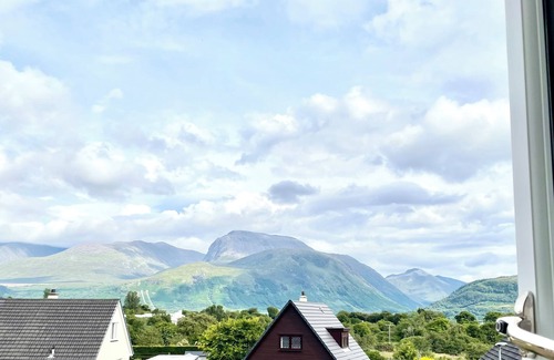 Corpach House | Views of Ben Nevis. Sleeps 5. 2 bedrooms. Garden. Parking. Beach/Canal.