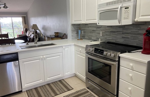Naples Condo | Views of the golf course from your private balcony