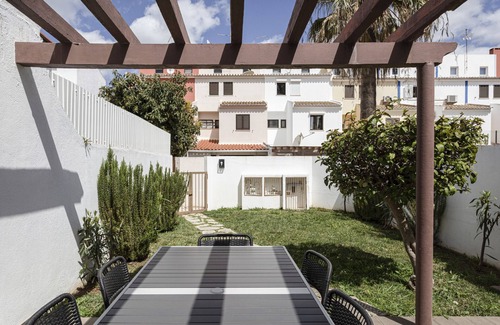 Vilamoura Ski Chalet | Vilamoura House Garden by Hopstays | Marina view