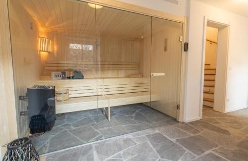 Lohme House | Villa BalticBliss auf Rügen - direkt am Golplatz mit Sauna und Jacuzzi