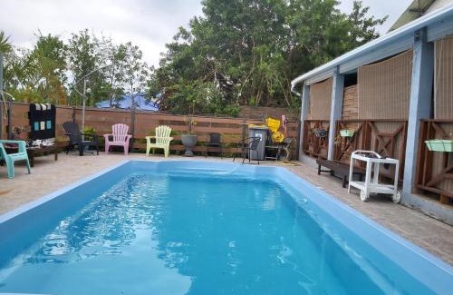 Trois Mares Villa | Villa chaleureuse près de Le Tampon avec piscine partagée