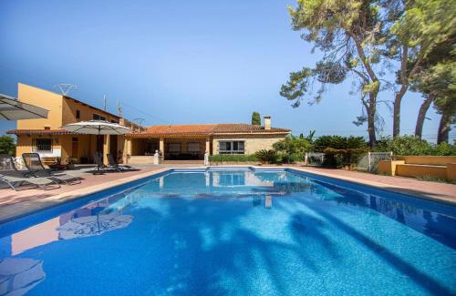 Picasent Villa | Villa con piscina y barbacoa para 13 personas cerca del metro
