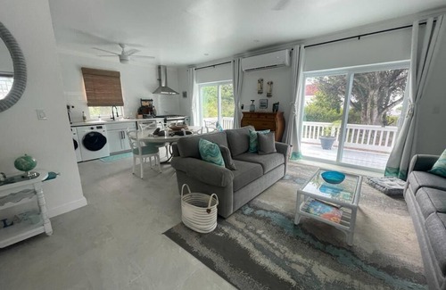 Rock Sound House | Villa De La Rose - A Stylish Escape! Enjoy sunset dinners.