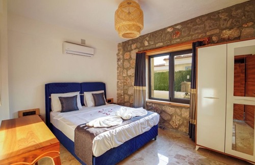 Seydikemer Villa | Villa Diamond located in Fethiye-Seydikemer is a good choice for large families.