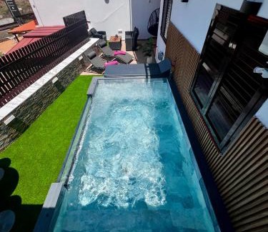 Puerto Rico Villa | Villa Puerto Rico in front of the shopping center with private heated saltwater pool with jacuzzi & t able fút boll & arcade games OR St andard Villa Puerto Rico in front of the shopping center with private heated saltwater big jacuzzi & arcade games